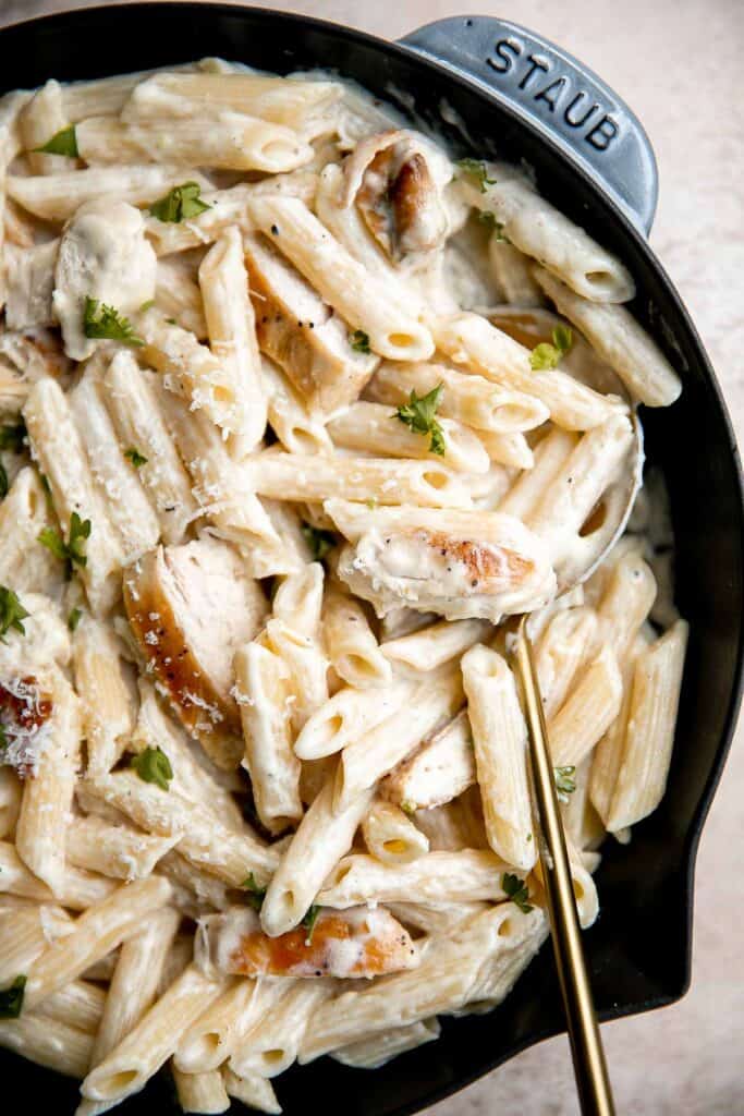 Chicken penne pasta is a quick and easy dinner that is delicious, rich, creamy, and flavorful. It’s a family favorite that’s ready in under 30 minutes. | aheadofthyme.com