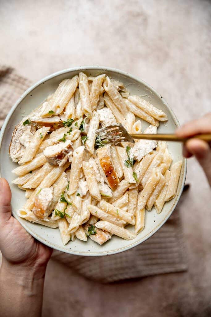 Chicken penne pasta is a quick and easy dinner that is delicious, rich, creamy, and flavorful. It’s a family favorite that’s ready in under 30 minutes. | aheadofthyme.com