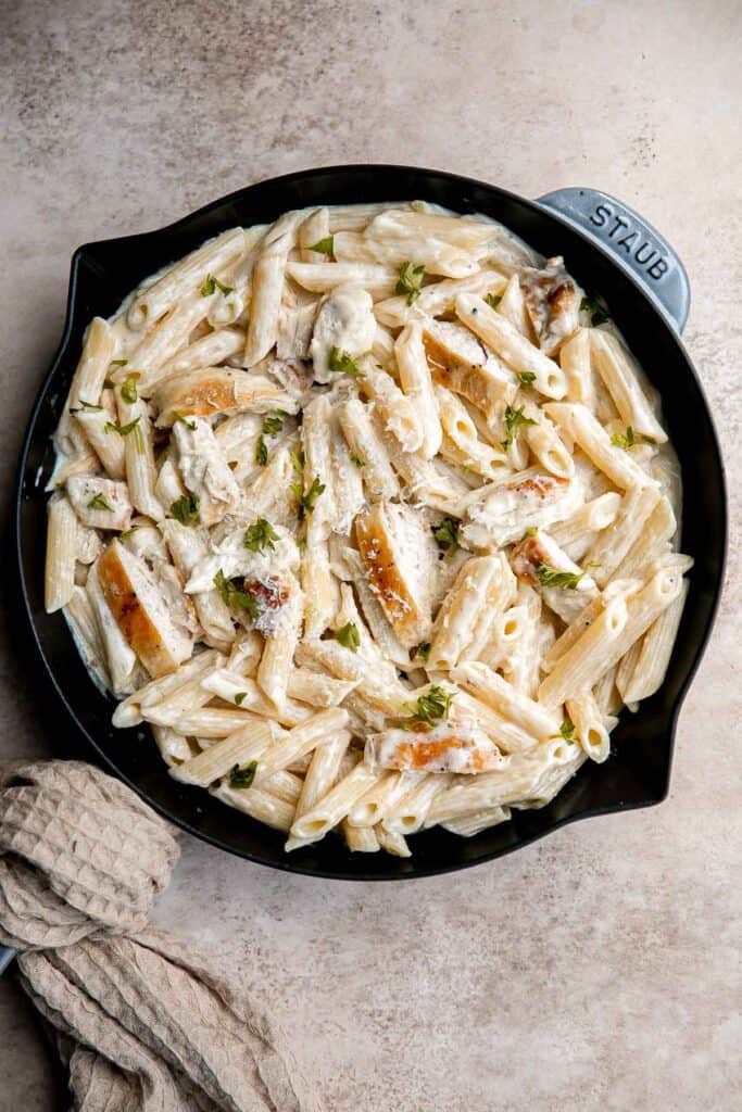 Chicken penne pasta is a quick and easy dinner that is delicious, rich, creamy, and flavorful. It’s a family favorite that’s ready in under 30 minutes. | aheadofthyme.com