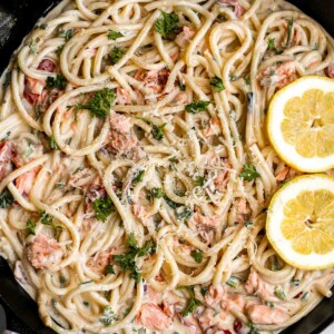 This simple creamy salmon pasta is quick and easy to make, delicious and flavorful, and loaded with salmon. A weeknight dinner in under 30 minutes. | aheadofthyme.com