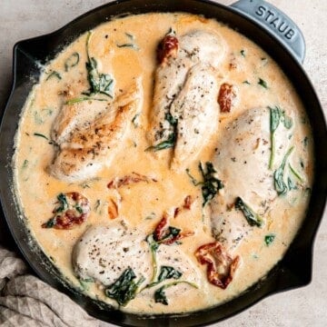 Creamy Tuscan chicken with sun-dried tomatoes and spinach is a quick and easy 30 minute Italian chicken dinner that is delicious, flavorful, and comforting. | aheadofthyme.com