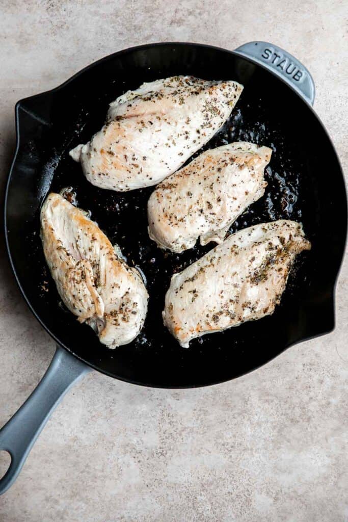 Creamy Tuscan chicken with sun-dried tomatoes and spinach is a quick and easy 30 minute Italian chicken dinner that is delicious, flavorful, and comforting. | aheadofthyme.com