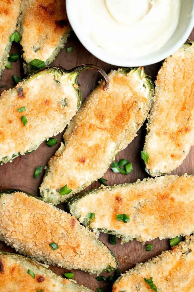 Jalapeño poppers are the perfect appetizer — spicy, crispy, cheesy, and creamy, toasted to golden brown perfection. Plus easy to make ahead and freeze well. | aheadofthyme.com