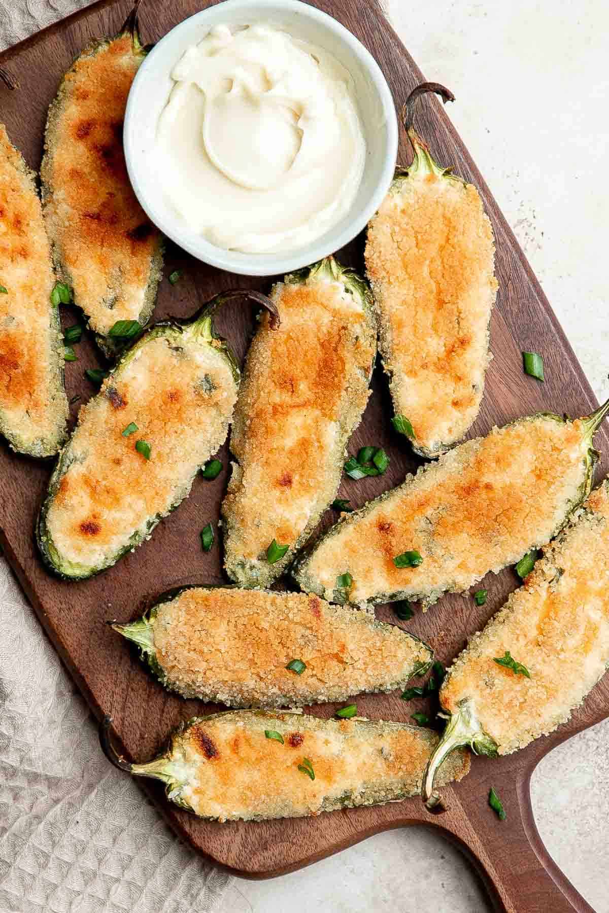 Jalapeño poppers are the perfect appetizer — spicy, crispy, cheesy, and creamy, toasted to golden brown perfection. Plus easy to make ahead and freeze well. | aheadofthyme.com