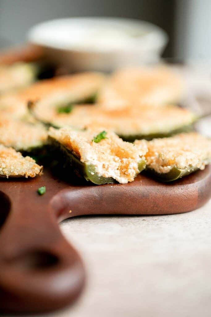 Jalapeño poppers are the perfect appetizer — spicy, crispy, cheesy, and creamy, toasted to golden brown perfection. Plus easy to make ahead and freeze well. | aheadofthyme.com