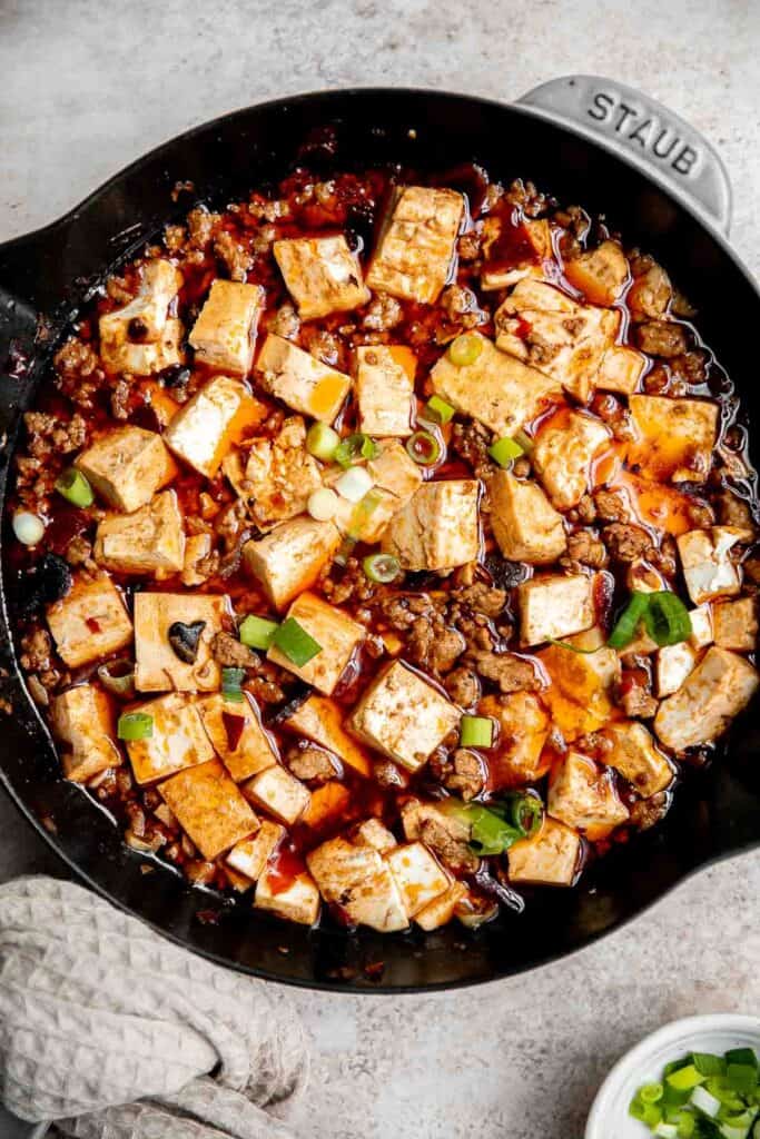 Mapo tofu is quick, easy, delicious, flavorful, spicy, and numbing that is ready in just 20 minutes. Serve it with steamed rice on busy weeknights. | aheadofthyme.com