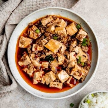 Mapo tofu is quick, easy, delicious, flavorful, spicy, and numbing that is ready in just 20 minutes. Serve it with steamed rice on busy weeknights. | aheadofthyme.com