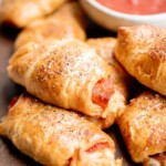 Pizza crescent rolls are a delicious, cheesy, easy appetizer ready in under 30 minutes — the perfect last minute bite, lunch or dinner, or game day appy. | aheadofthyme.com