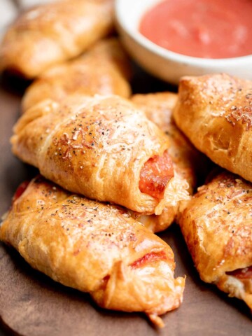 Pizza crescent rolls are a delicious, cheesy, easy appetizer ready in under 30 minutes — the perfect last minute bite, lunch or dinner, or game day appy. | aheadofthyme.com