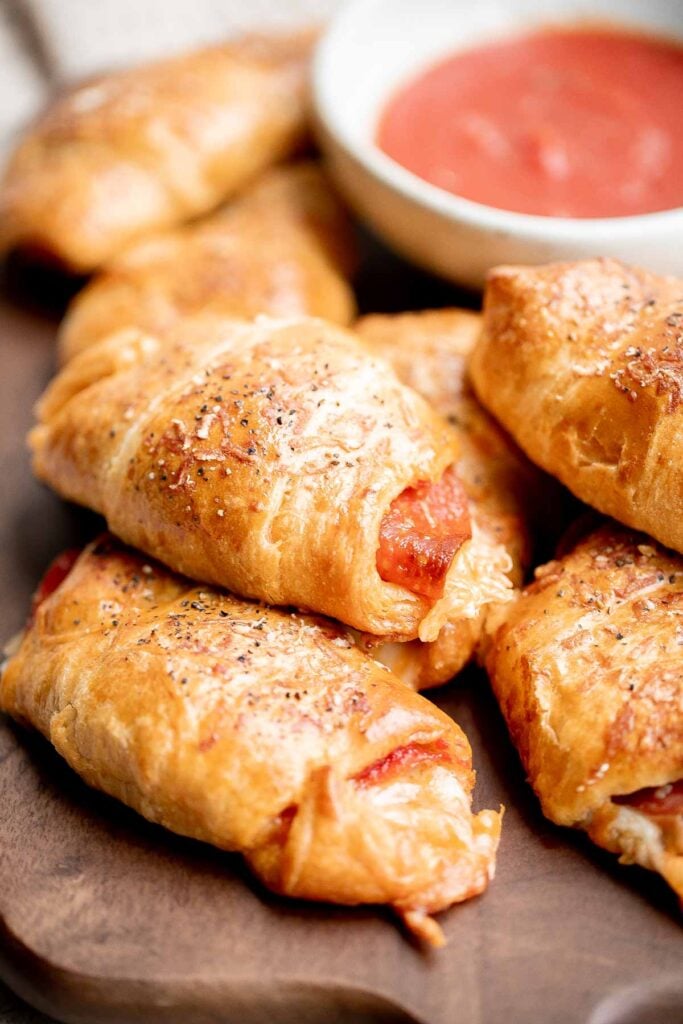 Pizza crescent rolls are a delicious, cheesy, easy appetizer ready in under 30 minutes — the perfect last minute bite, lunch or dinner, or game day appy. | aheadofthyme.com