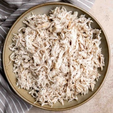 Shredded chicken is quick and easy to make (in three ways) and shred. It’s a staple ingredient to add to other recipes such as soup, salads, and sandwiches. | aheadofthyme.com