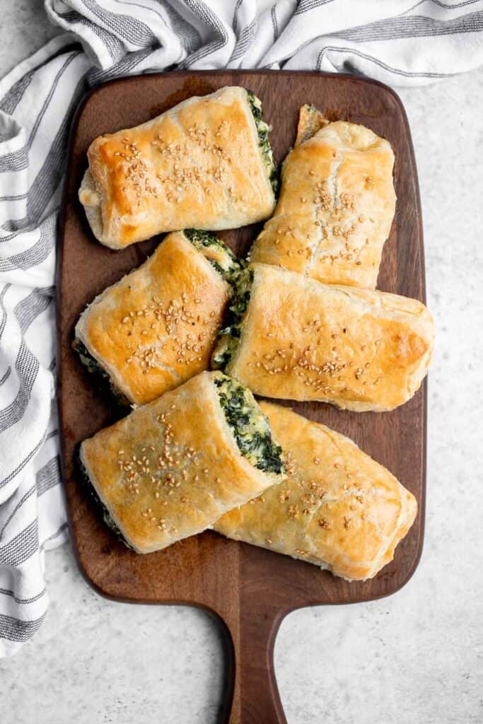 Spinach cheese rolls are an easy appetizer that's creamy, cheesy, comforting, and delicious. Serve as an appy at parties, for a school lunch, or snack. | aheadofthyme.com