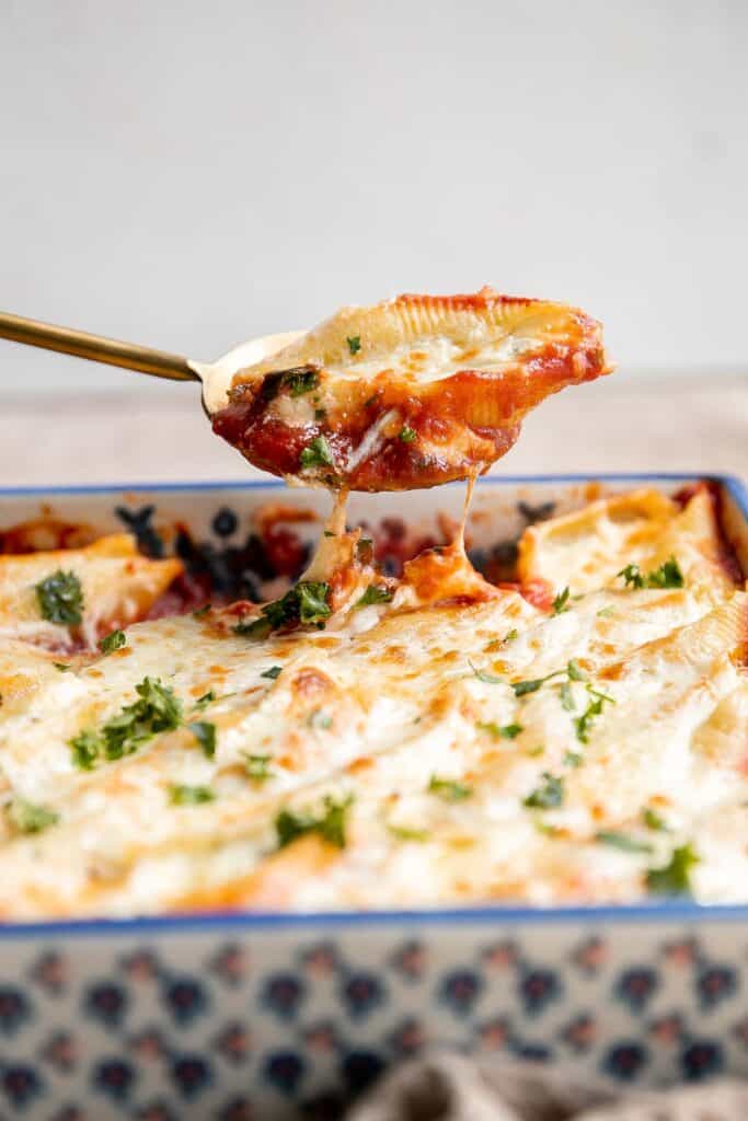 Ricotta stuffed shells are an easy, hearty, and classic Italian comfort food that can feed the whole family. Easy to make ahead and freeze for another day. | aheadofthyme.com
