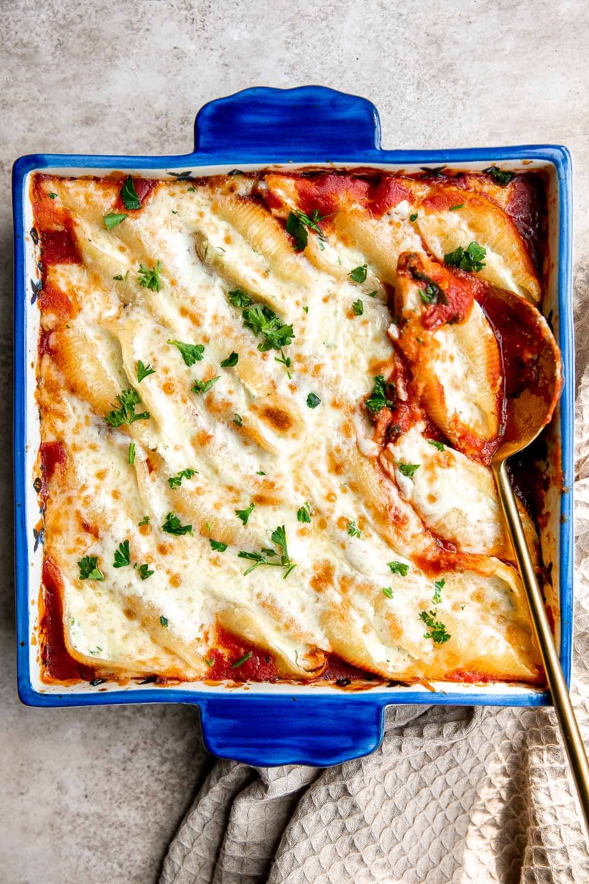 Ricotta stuffed shells are an easy, hearty, and classic Italian comfort food that can feed the whole family. Easy to make ahead and freeze for another day. | aheadofthyme.com