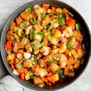 Sweet and sour pork is a delicious, quick and easy Chinese stir fry that takes just 30 minutes to make. Serve this homemade takeout over steamed rice. | aheadofthyme.com