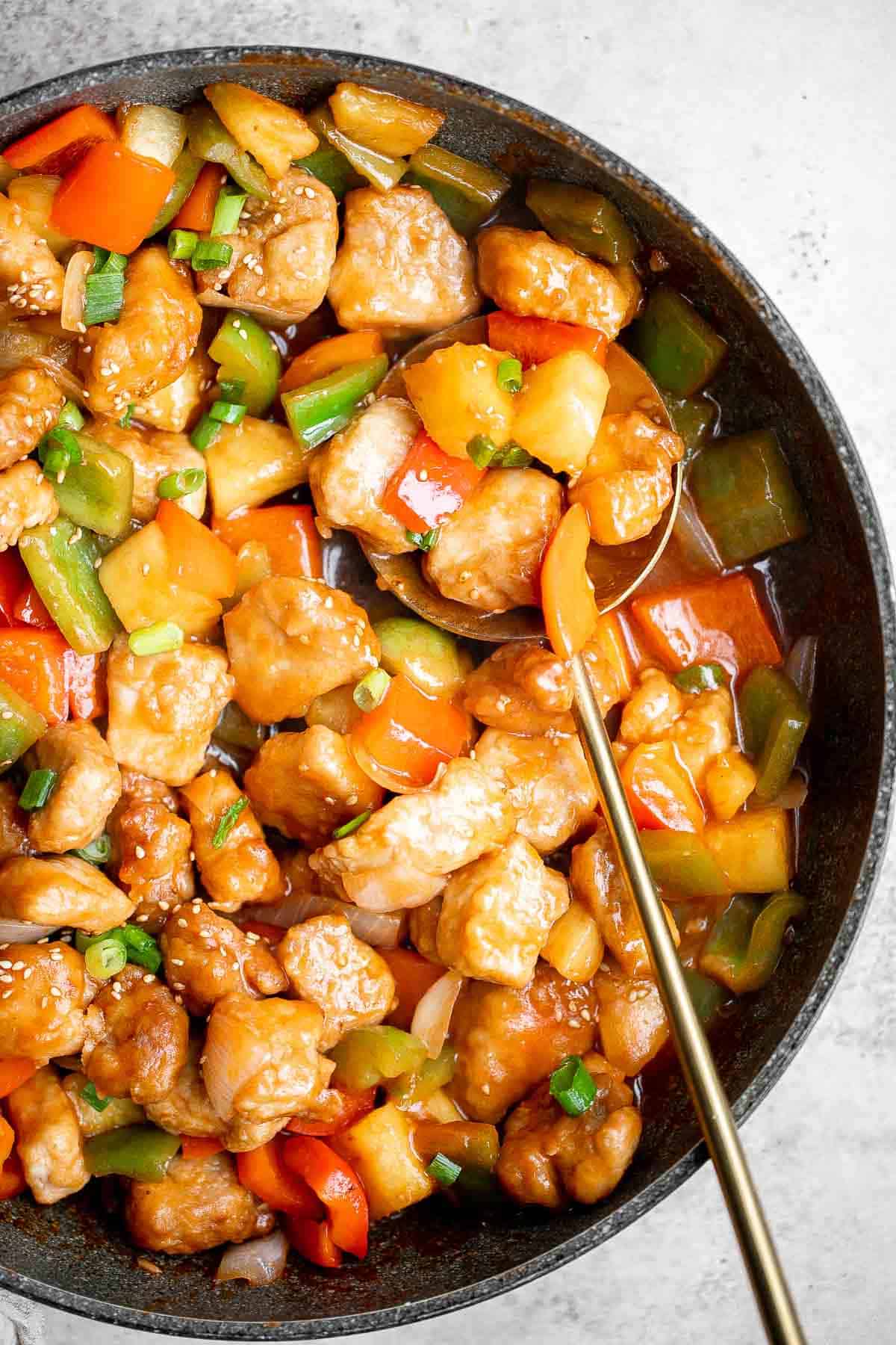 Sweet and sour pork is a delicious, quick and easy Chinese stir fry that takes just 30 minutes to make. Serve this homemade takeout over steamed rice. | aheadofthyme.com