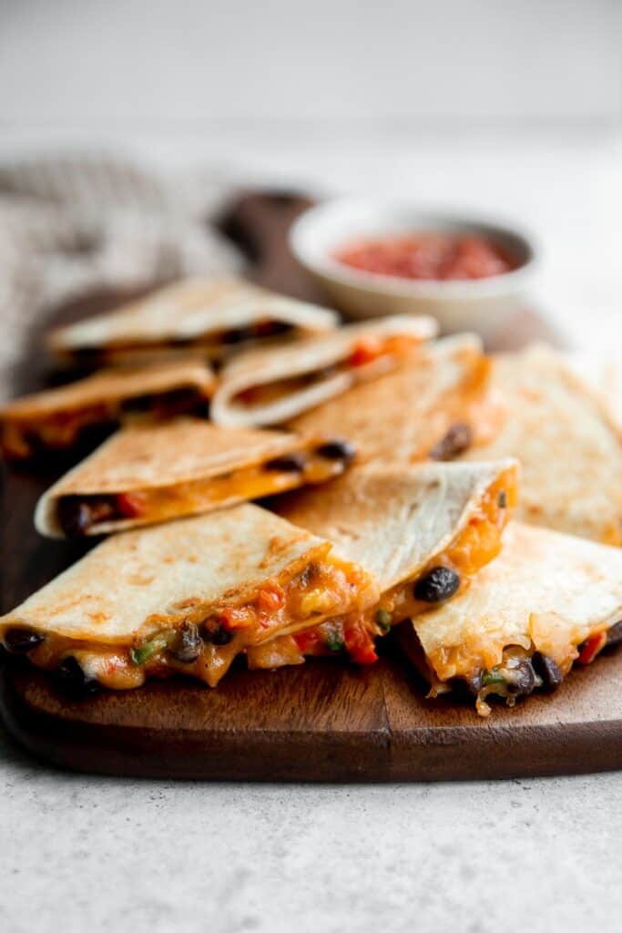Vegetarian quesadillas are quick and easy, completely customizable, loaded with veggies and beans. Serve this kid-friendly Mexican meal for lunch or dinner. | aheadofthyme.com