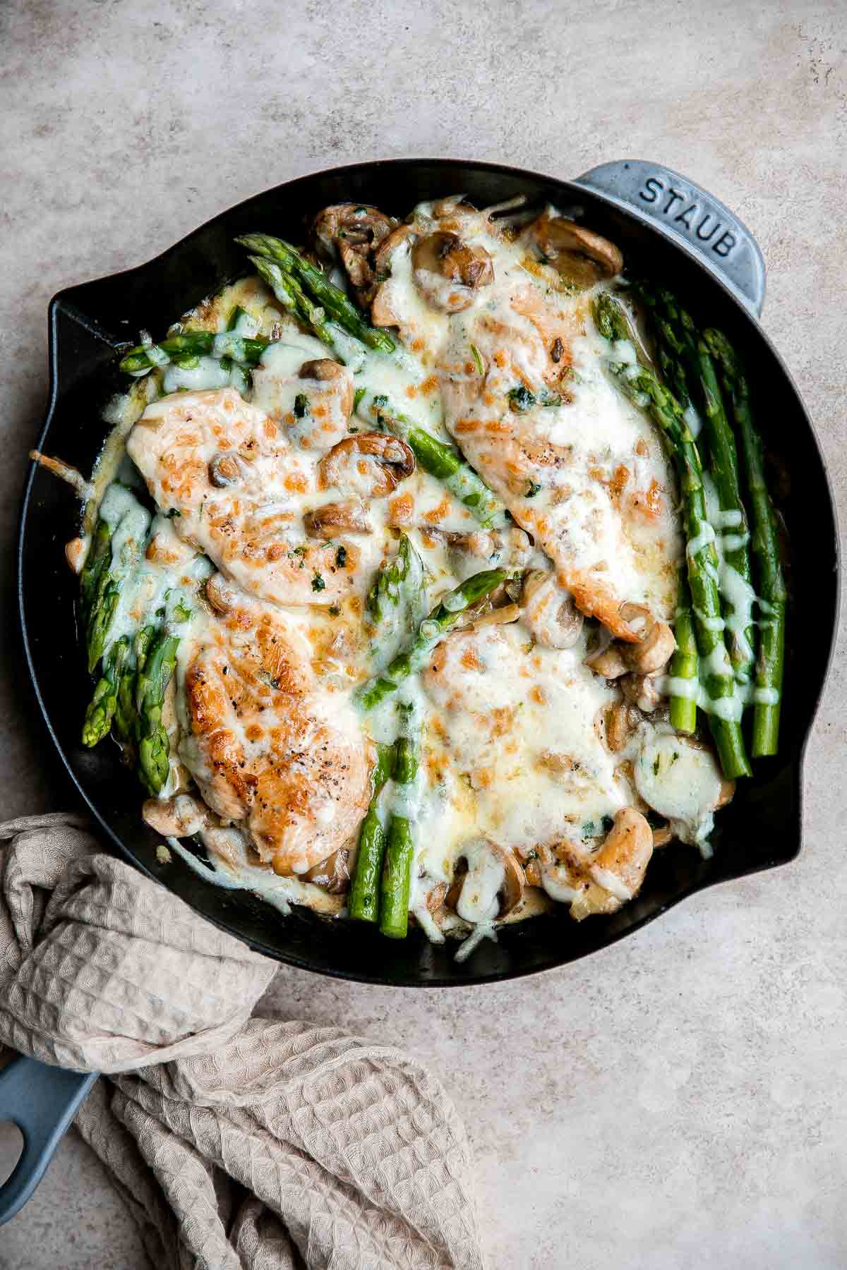 Chicken Madeira with sautéed mushrooms and tender crisp asparagus is topped with melty mozzarella cheese. Cheaper and better than the Cheesecake Factory! | aheadofthyme.com