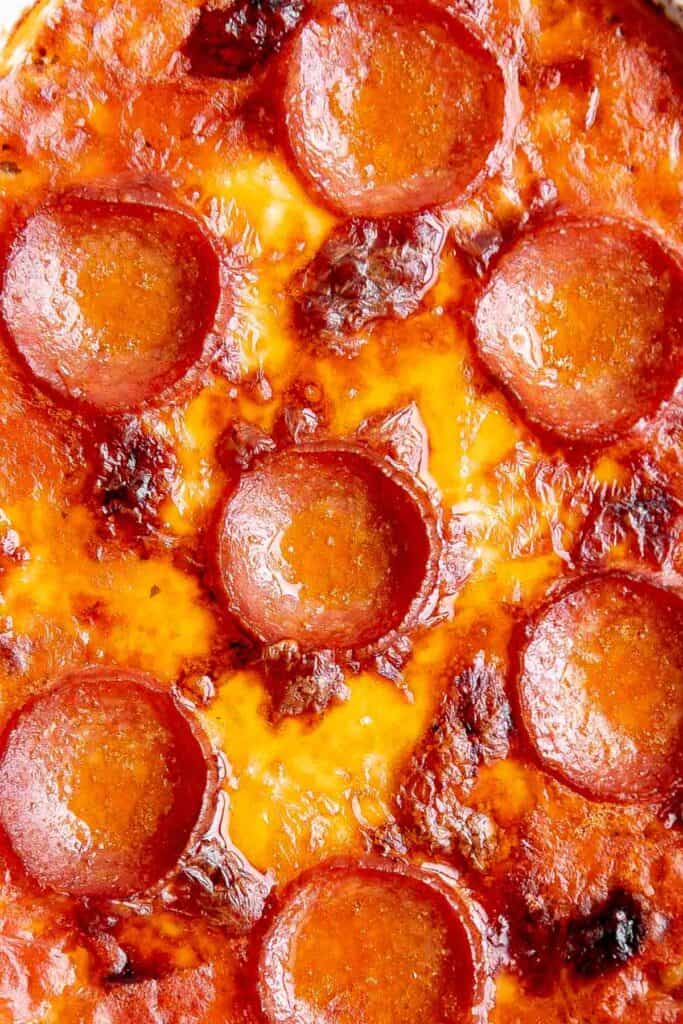 Pepperoni pizza dip is creamy, rich, comforting, and delicious. This appetizer is easy to make, easy to prepare ahead of time, and easy to eat. | aheadofthyme.com