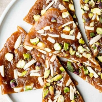 Sohan (Persian Pistacho Brittle) is a traditional Persian candy that is sweet, floral, and nutty, has the best crunchy texture, and is loaded with nuts. | aheadofthyme.com