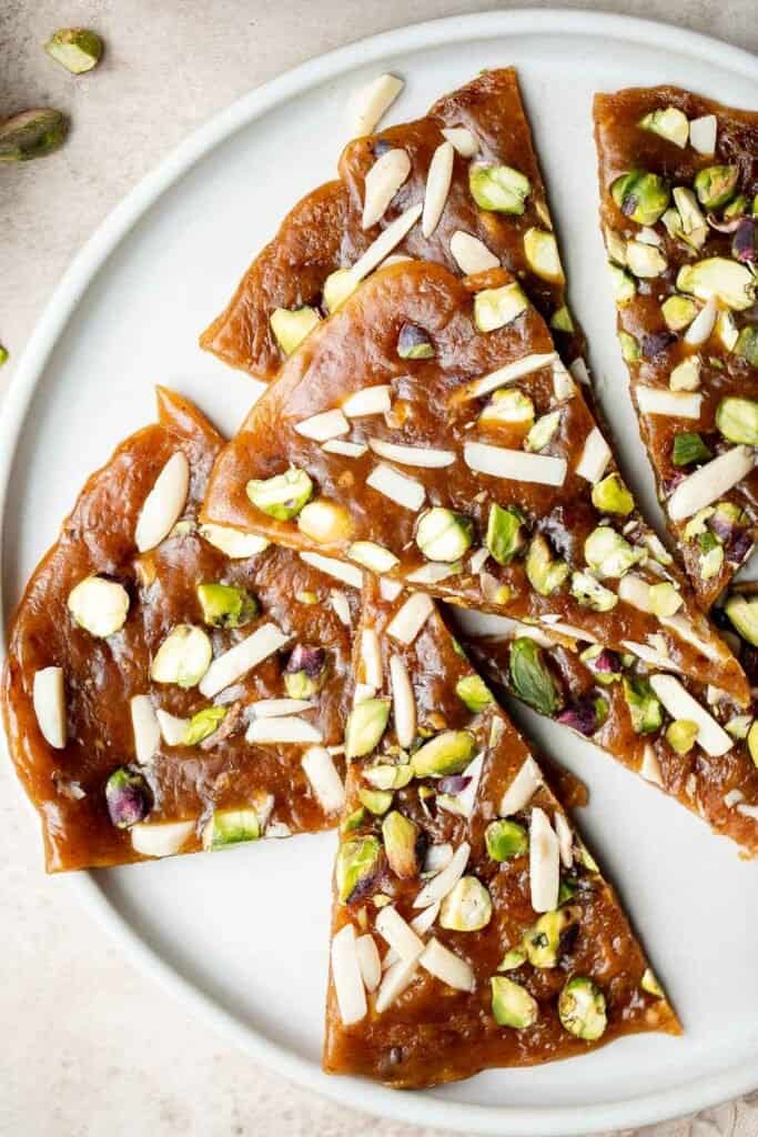 Sohan (Persian Pistacho Brittle) is a traditional Persian candy that is sweet, floral, and nutty, has the best crunchy texture, and is loaded with nuts. | aheadofthyme.com