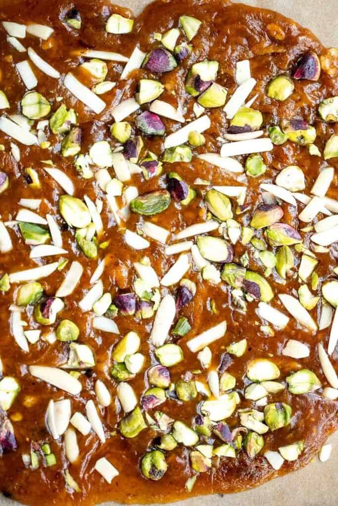 Sohan (Persian Pistacho Brittle) is a traditional Persian candy that is sweet, floral, and nutty, has the best crunchy texture, and is loaded with nuts. | aheadofthyme.com