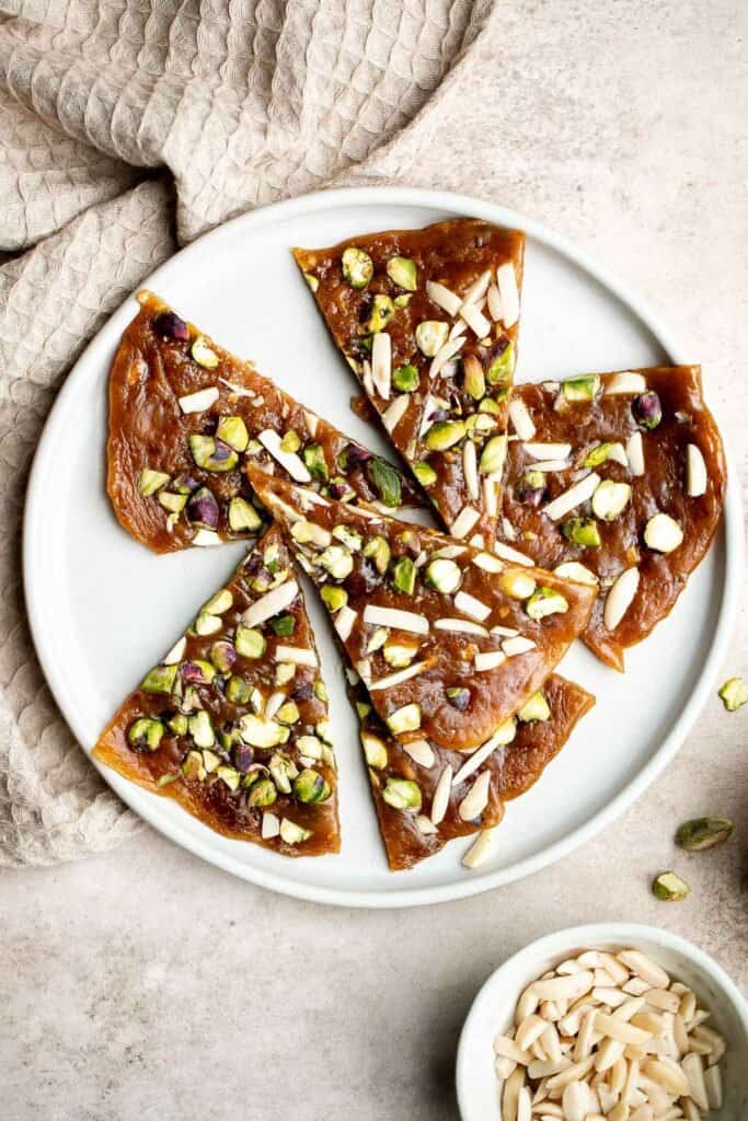 Sohan (Persian Pistacho Brittle) is a traditional Persian candy that is sweet, floral, and nutty, has the best crunchy texture, and is loaded with nuts. | aheadofthyme.com