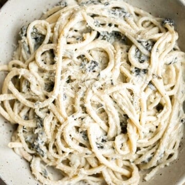 If you’re a fan of spinach artichoke dip, you need to try this spinach artichoke pasta. It's quick and easy comfort food is ready in under 30 minutes. | aheadofthyme.com