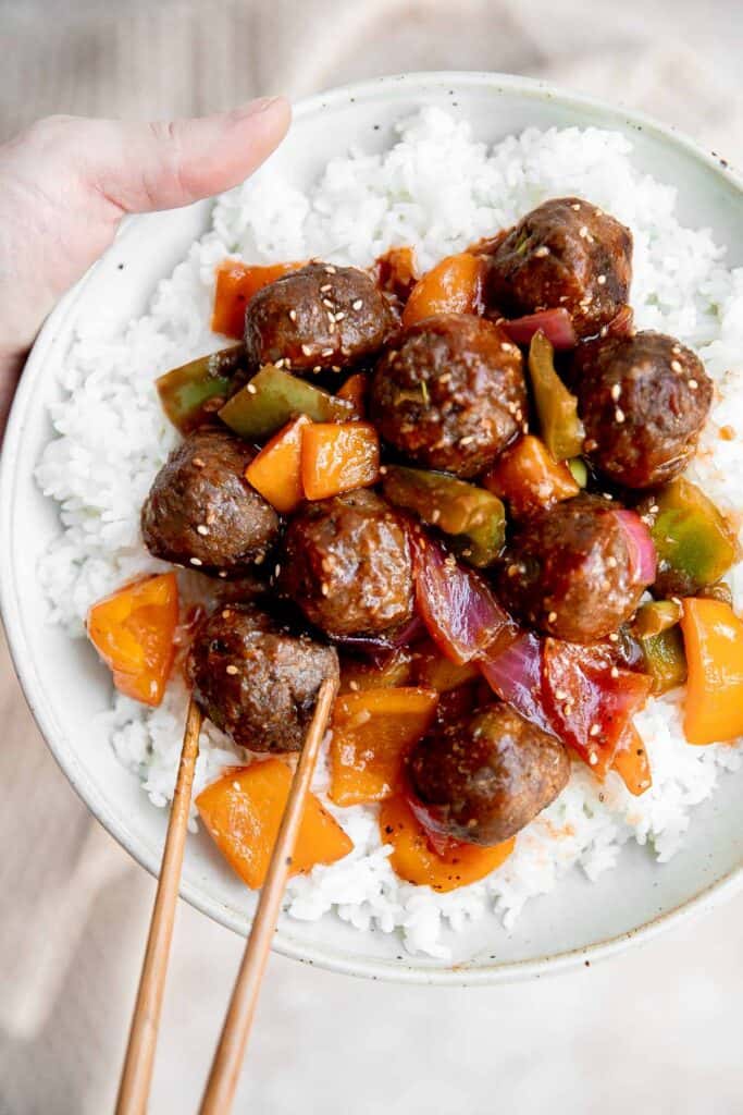 Sweet and sour meatballs are quick, easy, delicious, and flavorful, tossed in a vegetable and pineapple stir fry with homemade sweet and sour sauce. | aheadofthyme.com