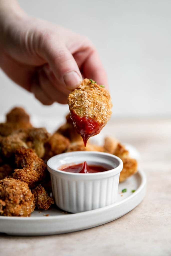 Air fryer cauliflower bites have a crispy breaded coating outside, yet tender and light inside. They are bite-sized, flavorful, easy to make, and healthy. | aheadofthyme.com