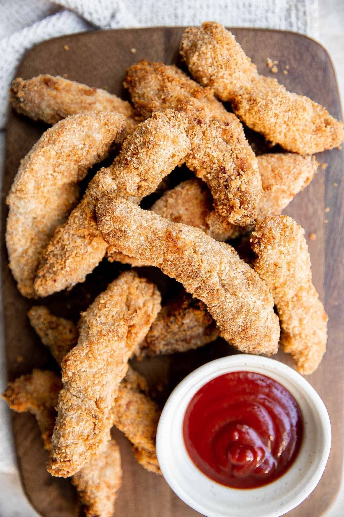 Air fryer chicken tenders are juicy and moist inside while crispy and golden brown outside. A healthy, delicious, and quick kid-friendly recipe. | aheadofthyme.com