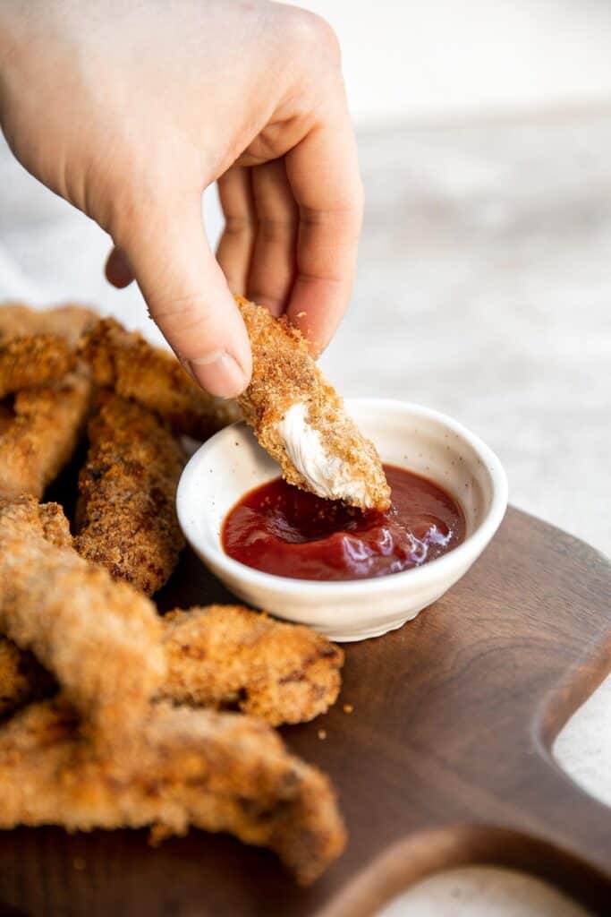 Air fryer chicken tenders are juicy and moist inside while crispy and golden brown outside. A healthy, delicious, and quick kid-friendly recipe. | aheadofthyme.com