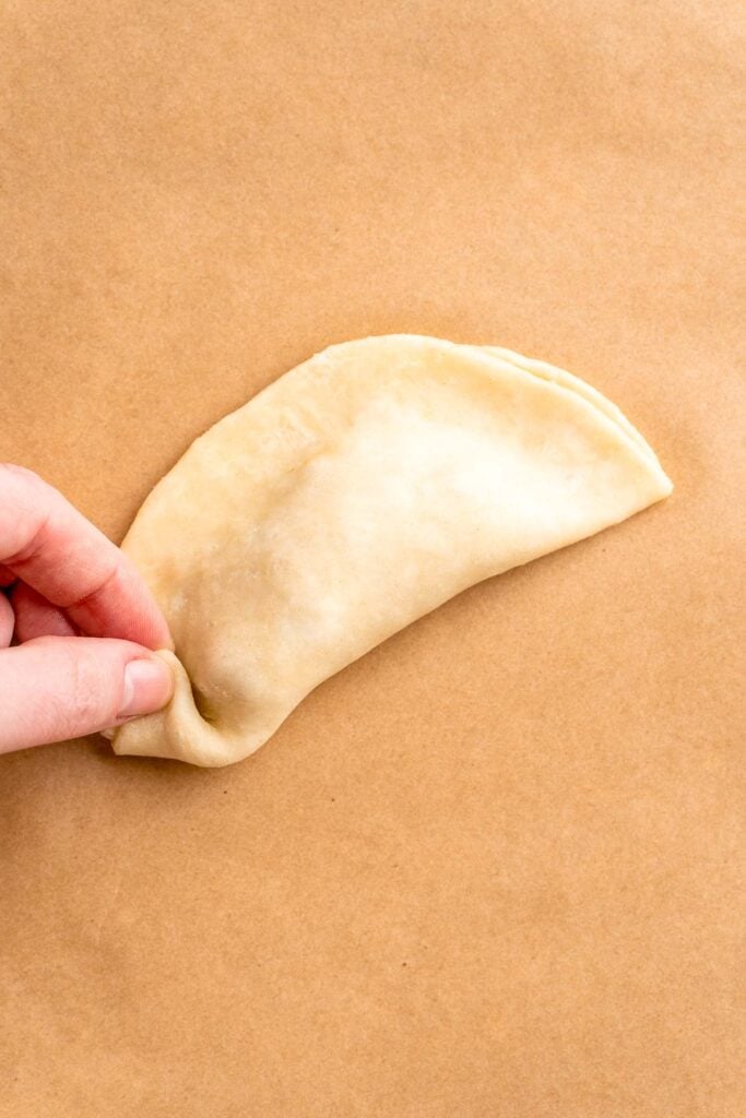 Homemade Beef Empanadas are a celebration of bold Latin-inspired flavors, featuring a savory, spiced ground beef filling wrapped in buttery, flaky pastry. | aheadofthyme.com
