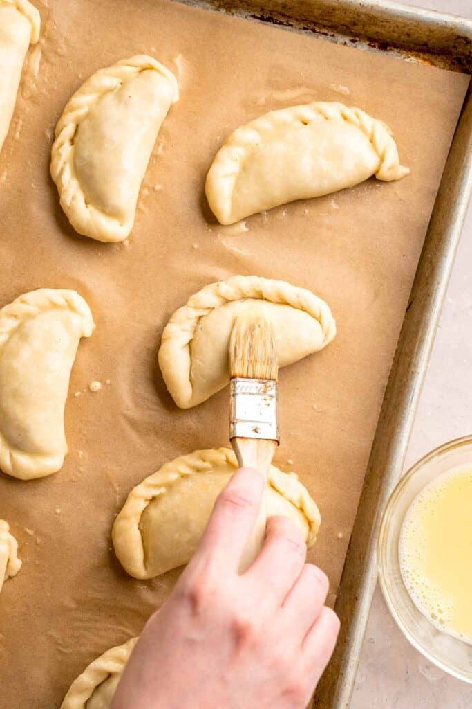 Homemade Beef Empanadas are a celebration of bold Latin-inspired flavors, featuring a savory, spiced ground beef filling wrapped in buttery, flaky pastry. | aheadofthyme.com