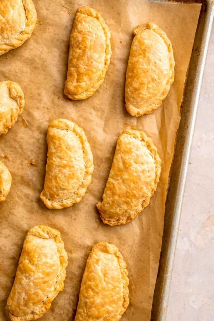 Homemade Beef Empanadas are a celebration of bold Latin-inspired flavors, featuring a savory, spiced ground beef filling wrapped in buttery, flaky pastry. | aheadofthyme.com