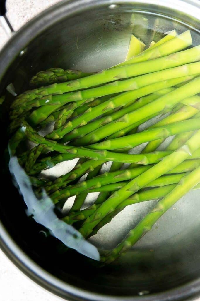 Chicken Madeira Cheesecake Factory copycat with mushrooms, crisp tender asparagus, and creamy Madeira sauce. Easy restaurant quality dinner at home. | aheadofthyme.com