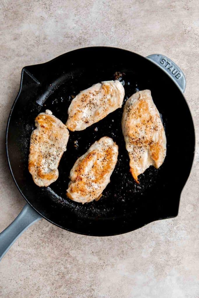 Chicken Madeira Cheesecake Factory copycat with mushrooms, crisp tender asparagus, and creamy Madeira sauce. Easy restaurant quality dinner at home. | aheadofthyme.com