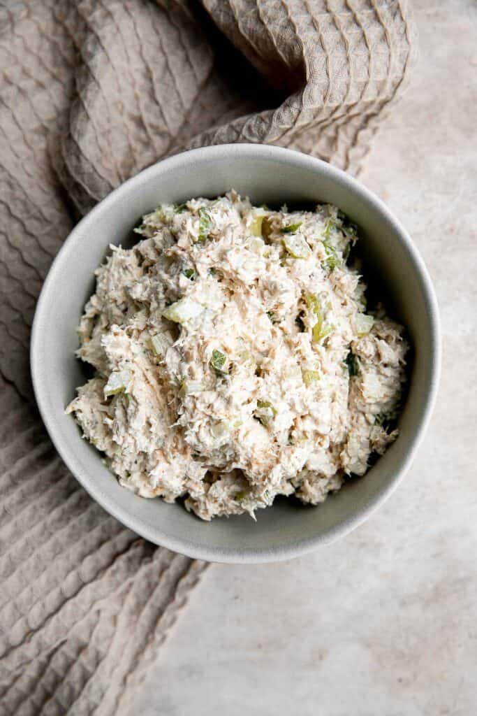 Classic chicken salad is a creamy delicious salad that is easy to throw together. It's the perfect side salad for a summer BBQ, potluck, or healthy lunch. | aheadofthyme.com