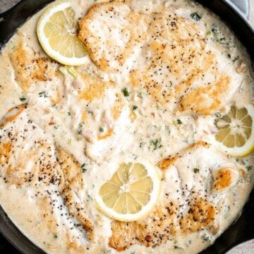 Creamy lemon garlic chicken is a quick and easy dinner idea that brings a restaurant-quality meal home. It's a flavorful and delicious 30-minute recipe. | aheadofthyme.com