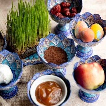 A complete guide to the traditional haft-sin table for Norouz (Persian New Year) including 7 essential items, common additional items, and Persian desserts. | aheadofthyme.com