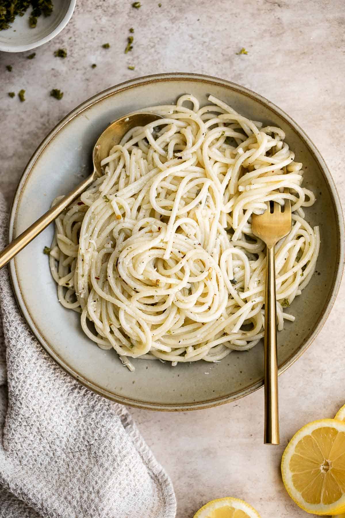 Lemon butter pasta is quick and easy to make, light yet filling, and loaded with flavor. A delicious twist on classic buttered noodles ready in 15 minutes. | aheadofthyme.com