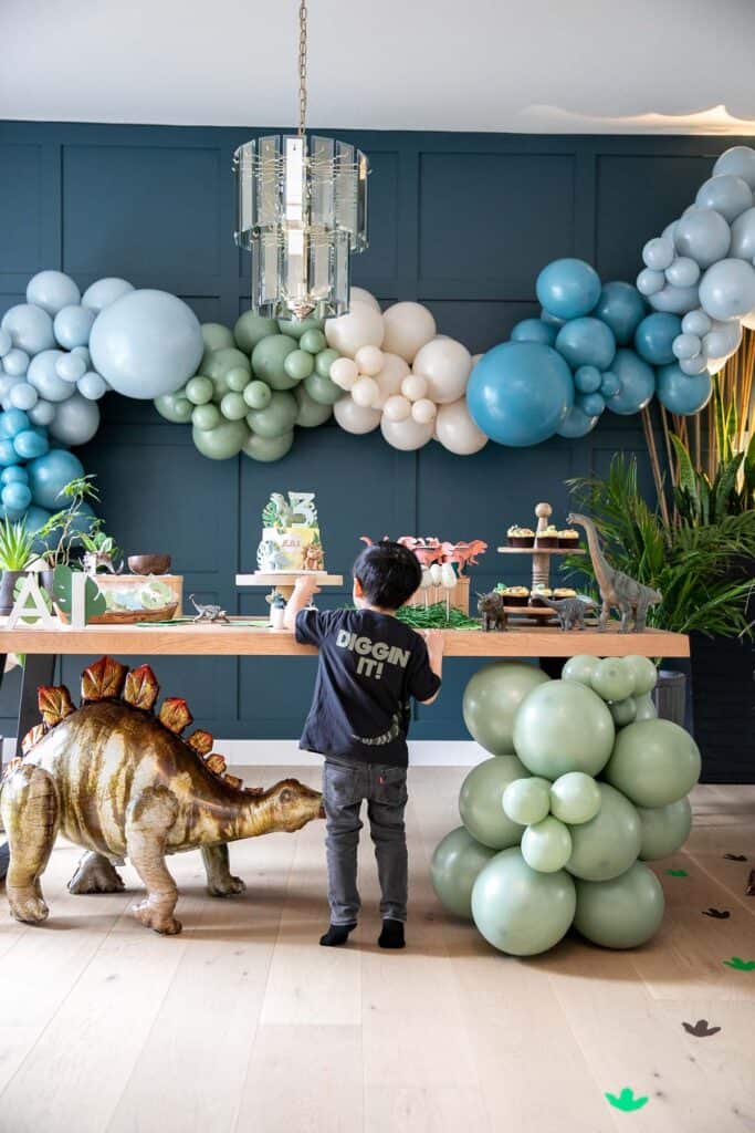 The best three rex dinosaur birthday party with ideas for an epic dino theme party including decor, craft table, party favors, desserts, and recipes. | aheadofthyme.com