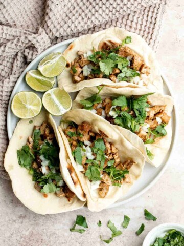 Chicken tacos are juicy and tender, loaded with flavor, delicious, and so easy to make. They are perfect for Taco Tuesday or a Cinco de Mayo Mexican fiesta. | aheadofthyme.com