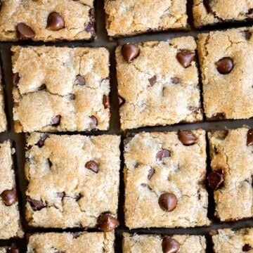 Soft and chewy chocolate chip cookie bars are a quick, easy, and lazy version of classic chocolate chip cookies that take half the prep time. | aheadofthyme.com