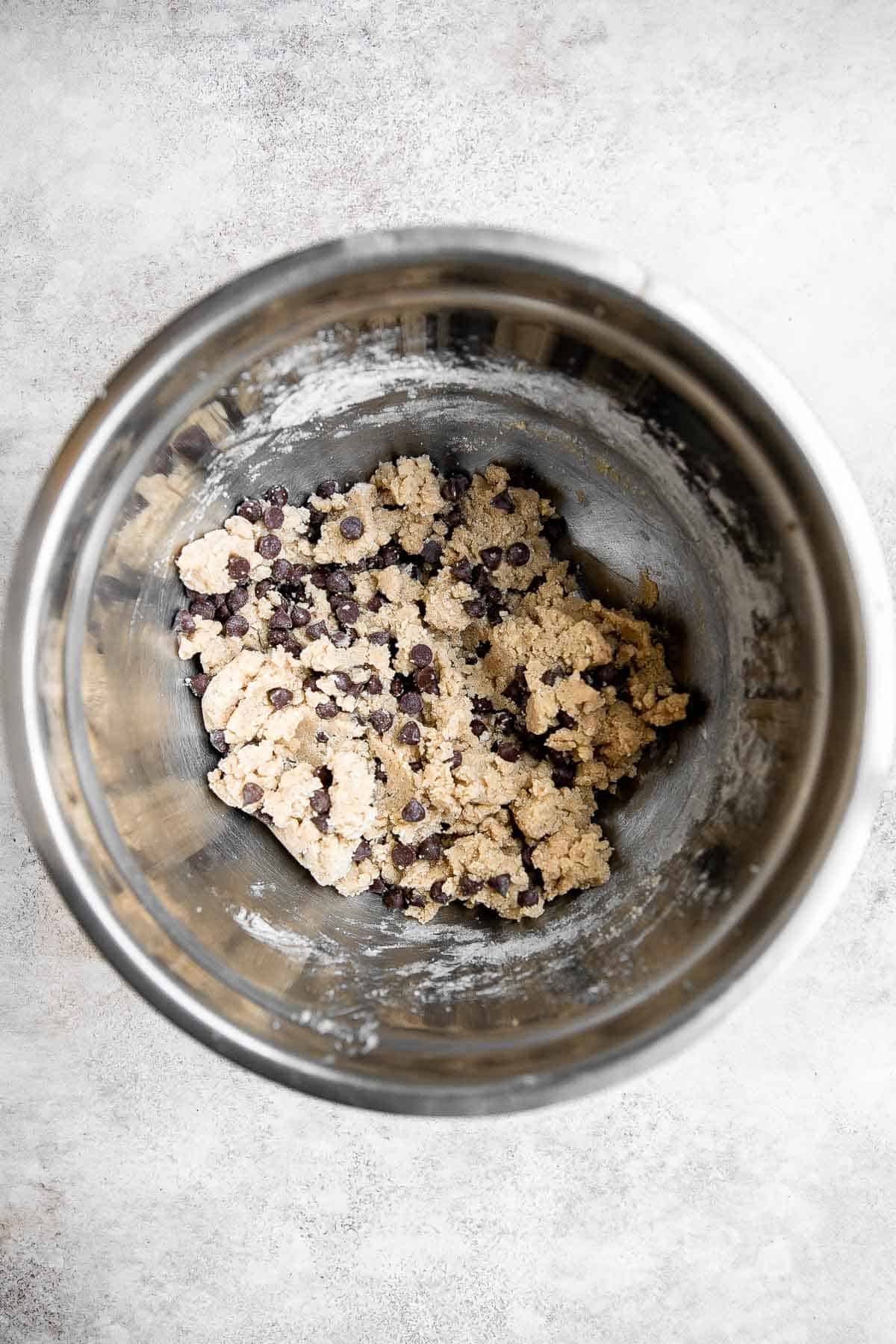 Soft and chewy chocolate chip cookie bars are a quick, easy, and lazy version of classic chocolate chip cookies that take half the prep time. | aheadofthyme.com