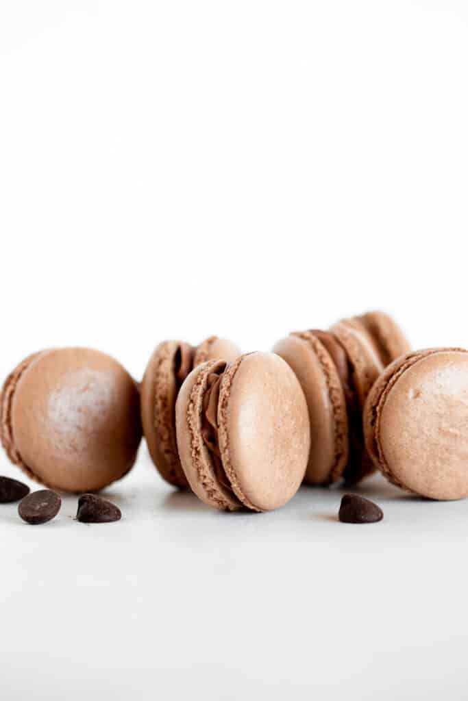 Chocolate macarons with chocolate buttercream are light and delicate, rich and sweet, and crisp and chewy. They are easier to make than you think! | aheadofthyme.com