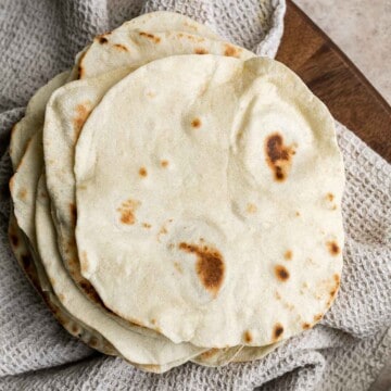 Homemade flour tortillas are delicious, soft, and so easy to make! They are easy to make with just 5 pantry staple ingredients and ready in under an hour. | aheadofthyme.com