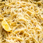 Lemon butter pasta tossed with garlic, Parmesan cheese, fresh parsley, and lemon.