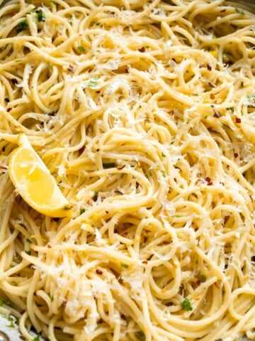 Lemon butter pasta tossed with garlic, Parmesan cheese, fresh parsley, and lemon.