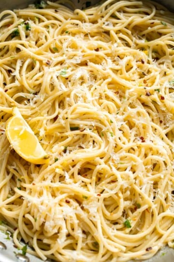 Lemon butter pasta tossed with garlic, Parmesan cheese, fresh parsley, and lemon.
